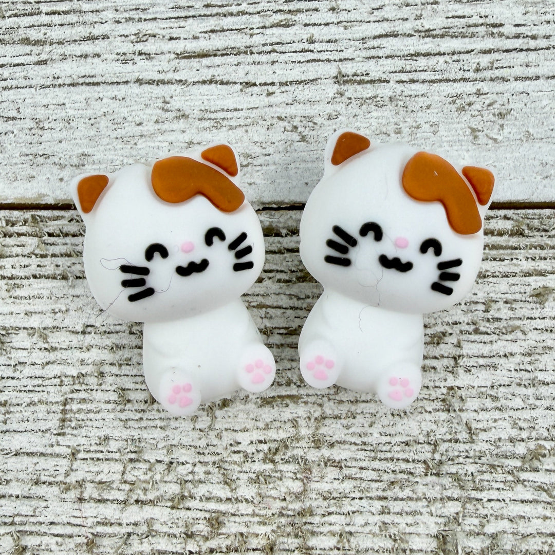 Bouchons d'aiguilles pour chat